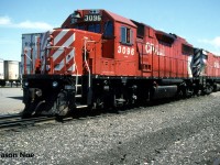 During a weekend afternoon, CP GP38-2 3096 and Control Cab 1102 wait between assignments at CP’s Lambton Yard in Toronto, Ontario. 1102 was built as C-424 4213 during 1965 and was converted into a control cab in early 1995, eventually being paired with 3096. It was sold to Quebec Railway Corporation in March 2004 and following a rebuild by Industrial Rail Services in Moncton, New Brunswick, it was acquired by the Pennsylvania-based West Chester Railroad in 2010.