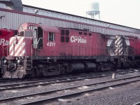 Back in the good old days when Alcos still roamed the earth, or at least Canada. CP 4211 MLW C424 is seen at Agincourt Diesel Terminal in August of 1983. Note the CP water tower.