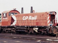 Once a common type of locomotive, end cab switchers are rarely seen nowadays. Shown here is SW1200rs CP 8156 at Agincourt yard in August of 1983, with an employee riding the front steps.