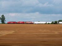 Here we have a pace shot of CP train H86 racing westbound through Crumlin on the Galt Sub, just miles away from their arrival at Quebec Street Yard in London.Props to Liam Macd for keeping pace.