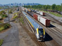 VIA 624 is passing CN's Southwark yard with a 'double small' consist made up from two Siemens consists which had surrendered cars to make two other Siemens consists longer than usual. With this consist having 32 axles, it will not face any crossing related speed restrictions.