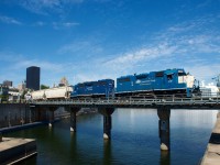 CN 500 leaving the Port of Montreal. Note the difference in the shades of blue between the two ex-GMTX units.