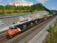 CN 527 is passing Turcot Ouest with CN, NS & IC power.