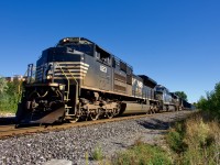 An SD70ACe is leading as run-through train CN 529 passes through St-Henri.