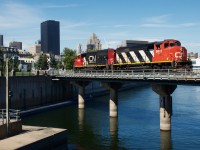 CN 9410 & CN 9590 are leaving the Port of Montreal light power after bringing cars in.