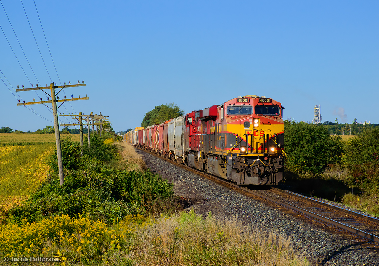 Thundering across the fields, CPKC 134 approaches the crossing at 43rd line east of Zorra.