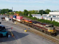 CPKC 119 with CP 7012 & KCS 4770 is lifting intermodal traffic at Lachine IMS Yard.