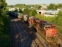 Sunset is perilously close as class leader CN 2500 leads CN 401. Military unit CN 3233 is third.