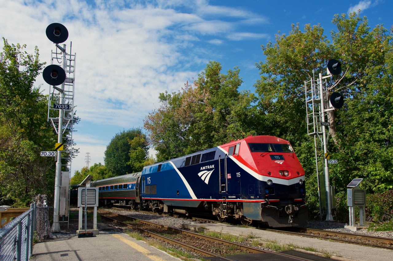 Repainted AMTK 115 on the Adirondack arriving at Saint-Lambert Station.