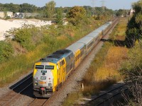 V70 with VIA 909 leading and VIA 913 pushing with a Clear Signal at Tansley, in the distance V97 "Amtrak Maple Leaf" waits on the east side. Planned work on the Metrolinx portion of the Oakville Sub. has VIA trains detouring the back way utilizing the freight only portion of the Halton Sub. as part of their routing.