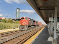 While waiting for a GO train I spotted a high green on the signal gantry west of the station and was rewarded with this freight.