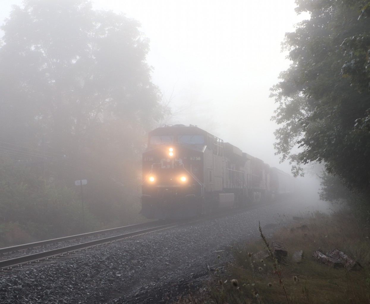 With the thick fog blanketing parts of the area, CPKC 135 comes out of it at around 8:20 in the morning with CP 8758, CP 9817 and CP 6259 as they head west up the Galt sub for a stop at Wolverton. Normally a shot that is completely back lit works out well with the fog obscuring the bright sun that would appear after it burned off around 9am here.