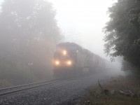 With the thick fog blanketing parts of the area, CPKC 135 comes out of it at around 8:20 in the morning with CP 8758, CP 9817 and CP 6259 as they head west up the Galt sub for a stop at Wolverton. Normally a shot that is completely back lit works out well with the fog obscuring the bright sun that would appear after it burned off around 9am here.