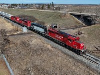 The weekly job from Red Deer to Stettler, CPKC B22-15 pounds the diamond with the CN Three Hills Sub with CP 5007, APXX 6347, CP 5049 and CP 6068. Alberta Prairie Railway 6349, is a former SP GP35 heading back to home rails in Stettler after being leased to a refinery in Prentis.
