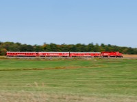 I understand why they did it, but it looked so much classier in the old red. I may be getting old. Pity there were no clouds to yell at :)