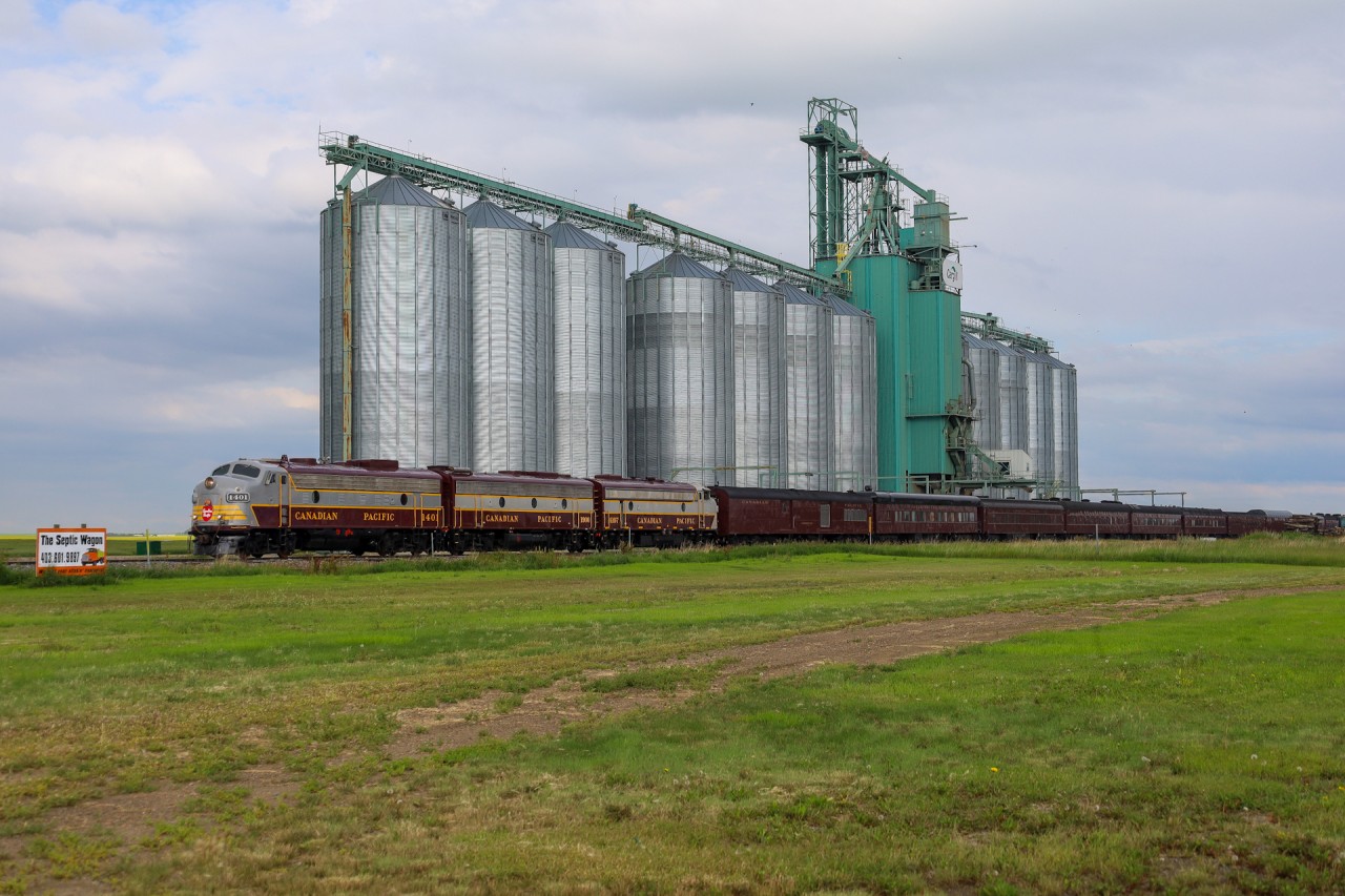 The Royal Canadian Pacific eases past the elevator at Blackie, as they prepare to protect the highway crossing in town.