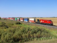 CPKC hotshot 112-18 cruises through Balgonie with CP 7515, CP 7478 and CP 7458. 