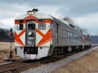 Montreal - Ottawa train 137, equipped with Budd cars, blast out of Montebello.

<br><br><i>Scan and editing by Jacob Patterson.</i>