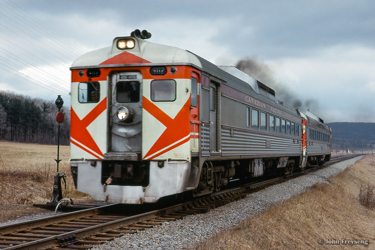 Montreal - Ottawa train 137, equipped with Budd cars, blast out of Montebello.

Scan and editing by Jacob Patterson.
