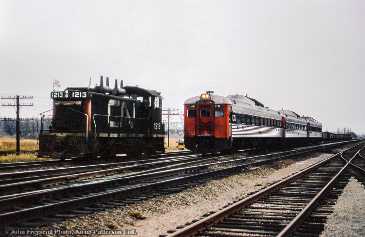 An extra wayfreight works the yard at Ingersoll while a set of eastbound Budd cars pass by on the main.

John Freyseng Photo, Jacob Patterson Collection Slide.