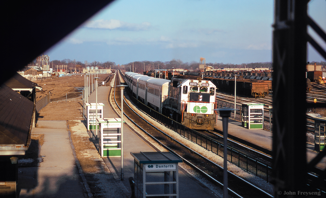 After rounding the curve and making its station stop, GO 9806 shoves east towards the end of the line at Pickering.Scan and editing by Jacob Patterson.