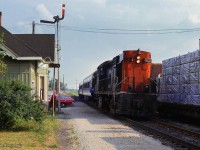 Commuter train 169, the Barrie Bullet, arrives at Maple, where a crew member is ready to step down for orders during their station stop.<br><br><i>Scan and editing by Jacob Patterson.</i>