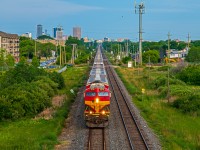 KCS 5019 leading a long line of grain hoppers East out of Winnipeg