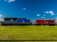 Northern Plains Railway unit 7278 sitting attached to Delaware & Hudson Railroad caboose 35719 in Manitou Manitoba