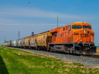 Hapag-Lloyd painted CP 8781 rumbling through the St. Boniface neighborhood of Winnipeg Manitoba. Making their way South to the United States border and beyond.