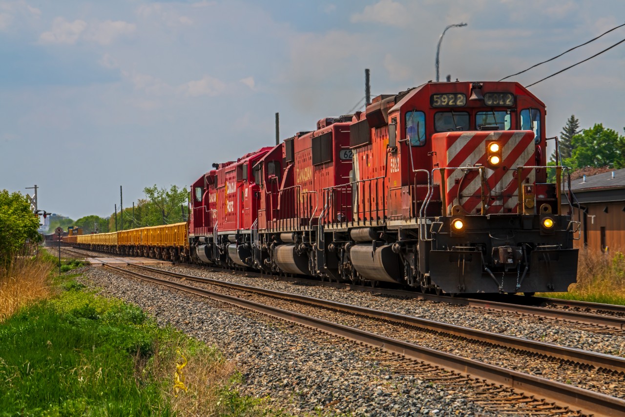 CPKC's track maintenance train slowly making it's way East out of Winnipeg
