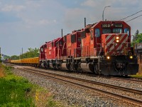 CPKC's track maintenance train slowly making it's way East out of Winnipeg