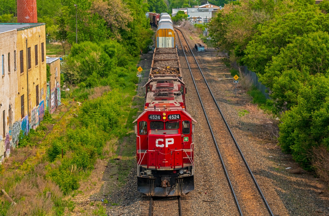 CP 4524 leads their way back into the CPKC Higgins yard under the Disraeli Freeway. Making their return from the daily Paddington yard job.