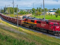 A fully loaded ballast train making their way South through St. James. They are heading down to between Domain and Osborne to drop of their cargo.