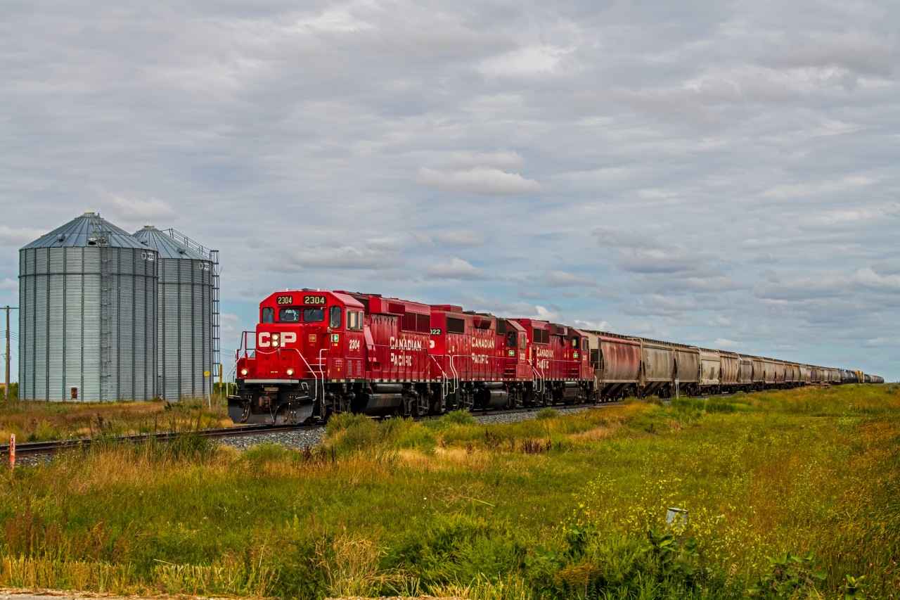 The mixed freight train making one of their three times a week trip to Rosenfeld and Altona Manitoba.