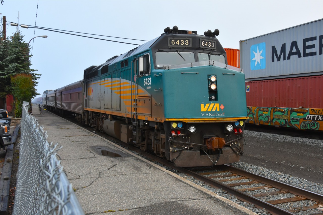 All Aboard!  
All that remains is for the step box to be tossed into the vestibule before VIA 006 The Skeena can depart the station at Prince George, BC on this overcast, foggy September morning. 
My recent trips on VIA 006 and VIA 005 The Skeena from Prince Rupert, BC to Jasper, AB and return had this same consist in both directions. One locomotive, one baggage car, one economy coach, and one Park car. 
Two engineers, two on-board crew, and a passenger count ranging from 27 to 45 made for a wonderful journey that was not too crowded in the dome of the Park car. :-) 
Another trip in the books. Hmmm, what's next? :-)