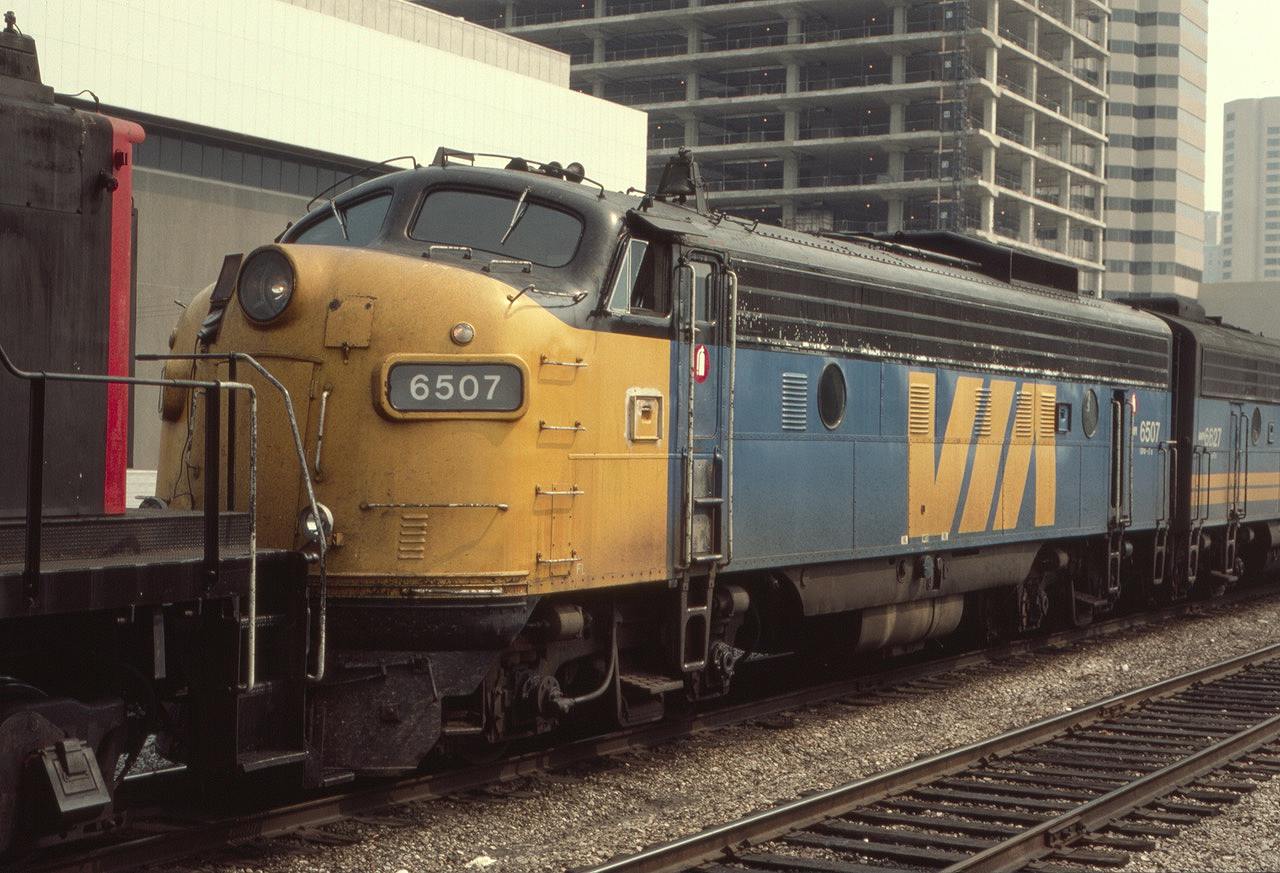 The wonderful passenger train activity at Toronto Union Station seemed endless in August of 1985. A westbound Via passenger train, with Via 6507 as the leader, is being brought down from the coach yards by a CN switcher to the west end of the trainshed. It was great to see those old F units still in service!