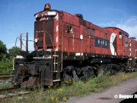 The Windsor and Hantsport Railway (WHRC) was a 56-mile (90.1 km) railway that operated in Nova Scotia between Windsor Junction, which was located north of Bedford and New Minas. Also, at Windsor there was a spur that ran several miles east serving two gypsum quarries located at Wentworth Creek and Mantua. WHRC had officially suspended operations in fall 2011 after the gypsum quarries closed. 
<BR>
In better times, WHRC RS23 8027 is photographed at Windsor, Nova Scotia by the shortline’s engine shop. It was one of the last active RS23’s that still retained a multi-mark and it was built as CP 8027 in September 1959.  
