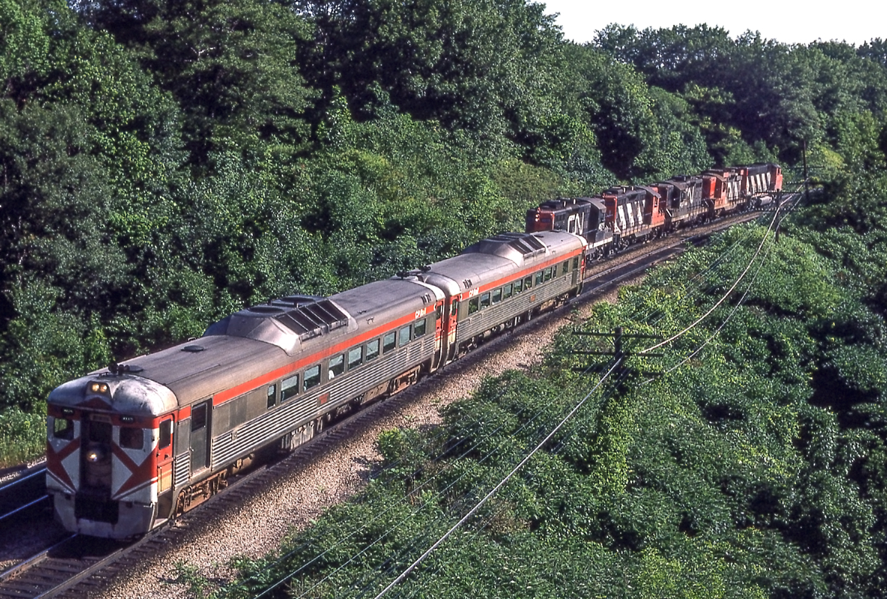 Although the RDC's are on a VIA train, these RDC's are still in Canadian Pacific paint. It is July 24, 1980 near Bayview Junction, Ontario.