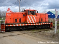 Canadian flag flying, this 80ton centrecab built 1950 numbered 615 is crossing Rusholme Road with their work done for the day. Former <a href=http://www.railpictures.ca/?attachment_id=17706 target=_blank>Stelpipe No. 7 (Mooney)</a> which was there <a href=http://www.railpictures.ca/?attachment_id=40864 target=_blank>over 20 years</a>, and eventually re-numbered during Universal Resource Recovery days  - 615 being the address of the facility. In 2021 615 failed TC inspection and was parked then scrapped in 2023.  GIO/Lambton supplies locomotives here now, 108 the S13 didn't last too long and is out of service and LDSX 913 (nee WSOR) is pinch hitting for now. For Niagara guys did CN/CP both go in here before the diamond was removed in the early 2000's?