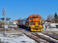 GEXR 582 makes a few late afternoon moves before departing Guelph for Preston.  The short consist is shoved into XW22 to spot a centrebeam, and shortly the crew will be homeward bound with work at FloChem.