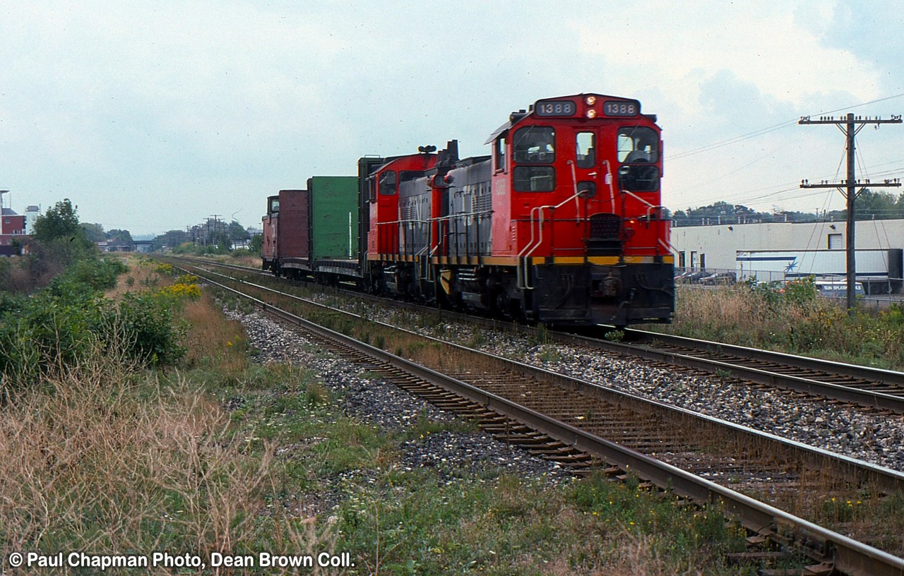 CN 549 with CN SW1200RS 1388 returning to Merritton and pulling out the empties from Stark Lumber in St. Catharines. Their switch was pulled up in 2009 no longer use rail all by trucks.