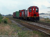 CN 549 with CN SW1200RS 1388 returning to Merritton and pulling out the empties from Stark Lumber in St. Catharines. Their switch was pulled up in 2009 no longer use rail all by trucks.