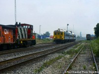 550 with CN GMD1u 1418 is meeting VIA 640 with VIA RDC-2 6211
