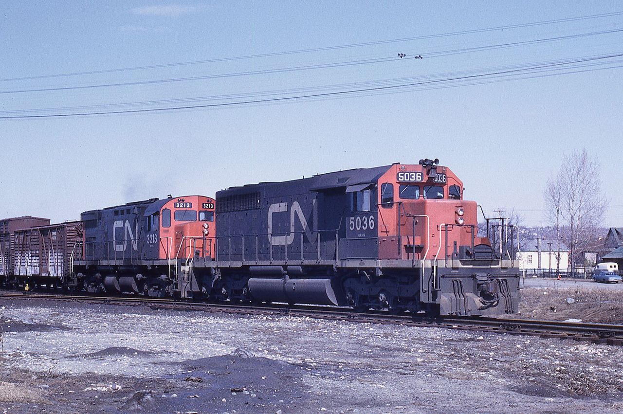 CN train 304 heads east out of Capreol Yard on April 12, 1969.  The combination of an SD40 and C424 were fairly common at the time.  The train was most likely running as regular timetable train 892.  I loved working the Alderdale Sub where it was common to have "right over" orders and "make your own meet" situations.