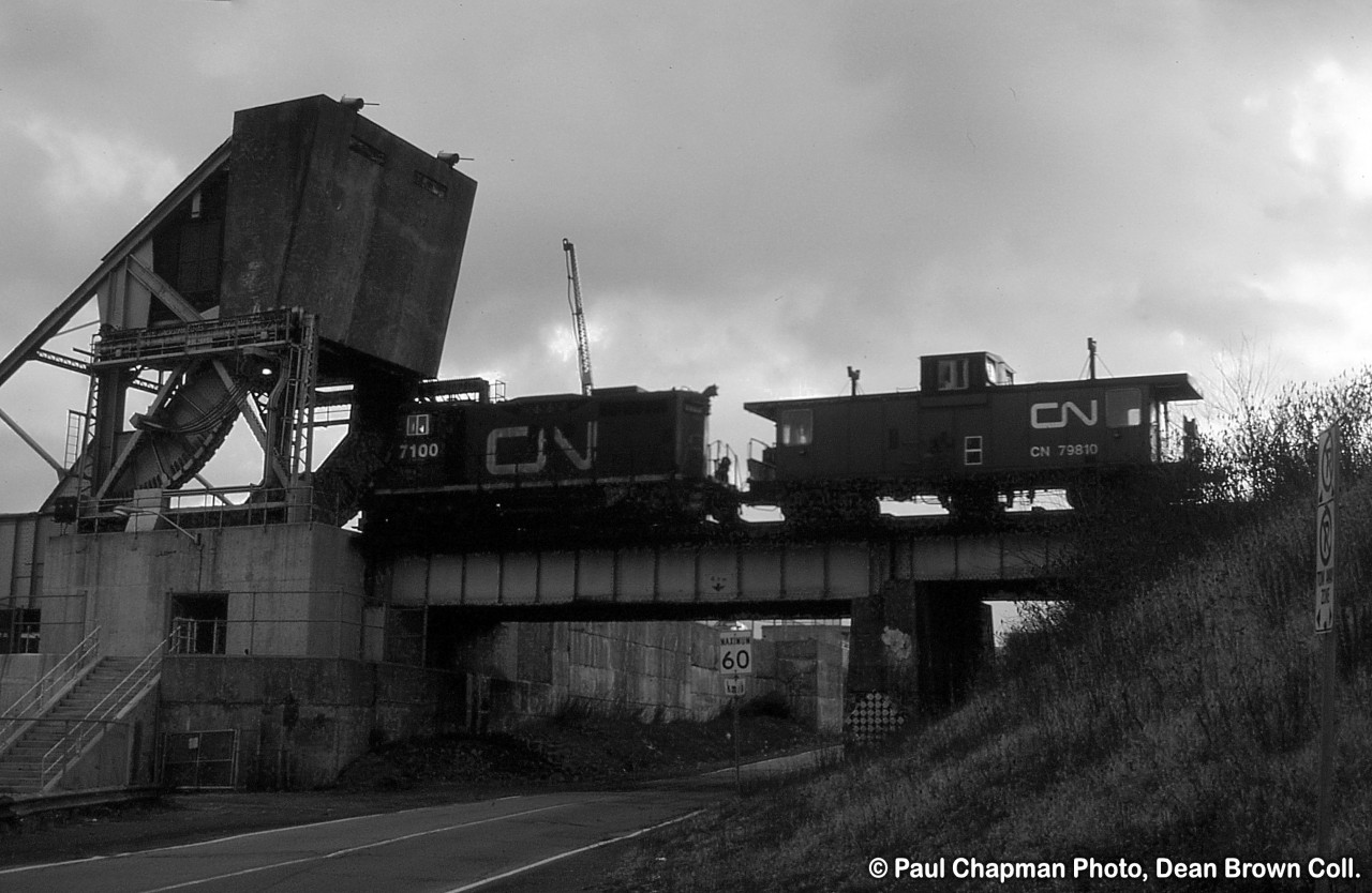 CN 550 with CN SW1200RSM (Sweep) 7100 heading across the Seaway for GM.