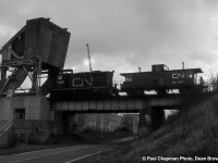 CN 550 with CN SW1200RSM (Sweep) 7100 heading across the Seaway for GM.