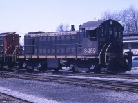 CN MLW switcher 8469 is shown being shuffled around Stratford yard. The 8469 was built by MLW in 1953. It is classed as MS-7b and is equipped with 14EL brakes.