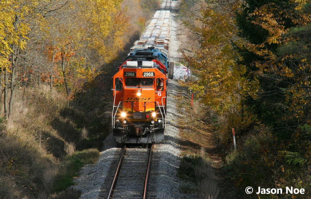 CN L568 with BNSF 2968, CN 7501 and CN 4906 are exiting the town of New Hamburg, Ontario on the Guelph Subdivision heading to Stratford and then to industries further west on the line.