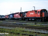 During a scorching August afternoon, a lengthy string of motive power is observed at CP’s Aberdeen Yard in Hamilton, Ontario. The units included; CP C-424 4226, SD40-2 786, Conrail SD40 0809, GP9u 8248 and C-424 4216. SD40 0809 was part of a group of unit’s leased through Conrail at the time to assist CP through their motive power shortage. Other blue SD40’s were leased through Conrail Leasing as well. 
