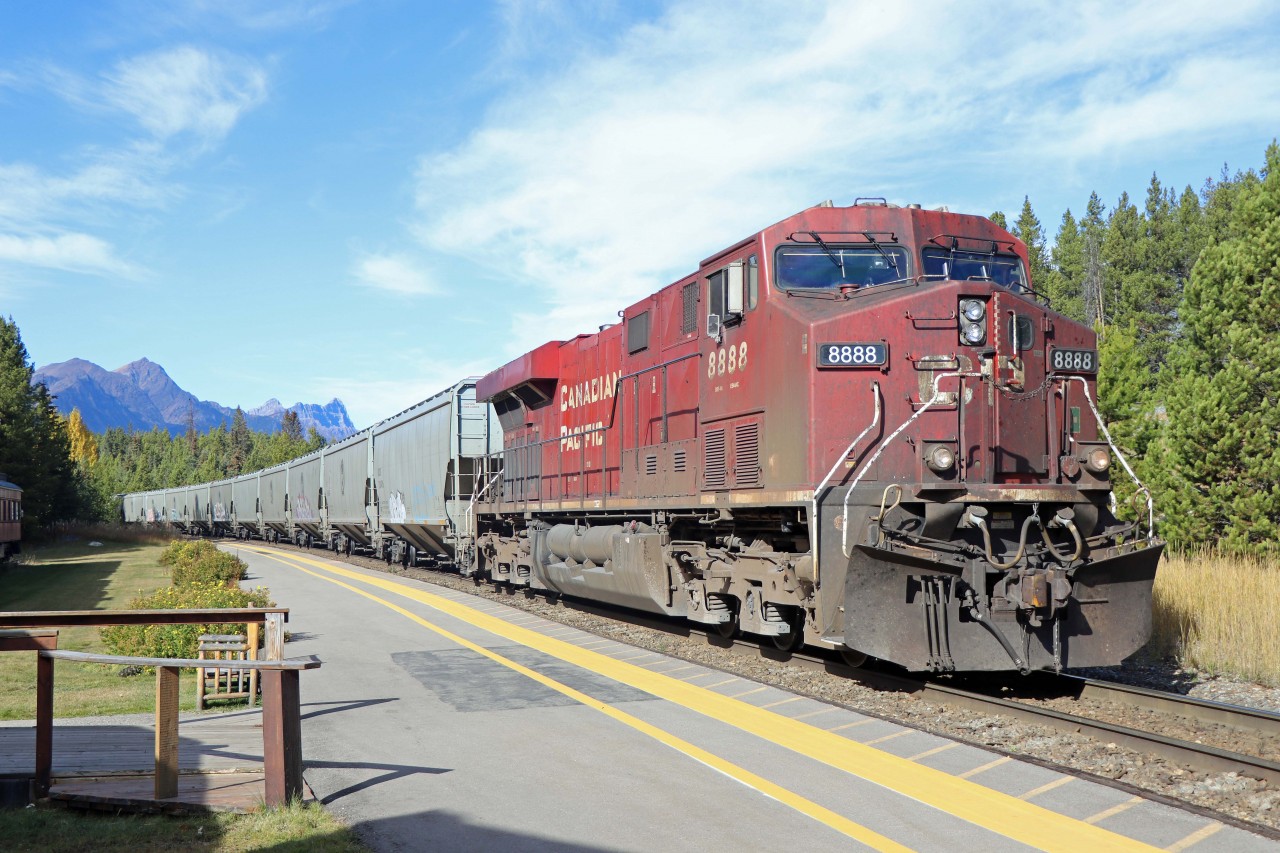 Having originated at Sapperton (New Westminster) on CN, CPKC grain empties wait in front of the Lake Louise Station restaurant for a westbound loaded grain train (301-419) on a beautiful fall day. Unfortunately, the restaurant will be closing after the Thanksgiving weekend, having been sold to Armstrong Collective (the parent company of Rocky Mountaineer).